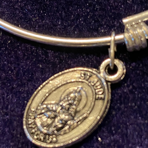 5/$50 Adjustable Silver Bracelet
With a silver double sided Medallion - Picture 8 of 10